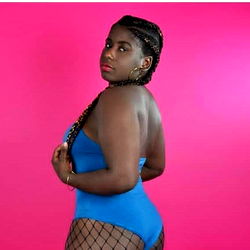 Dominicana Chocolatosa Strikes a Confident Pose