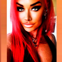 Kelly, OnlyFans Model with Red Hair and Piercings