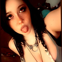 Adrestia5010, a popular OnlyFans model, shares her unique style and expresses her playful side in this image. Age: 28, Gender: Female