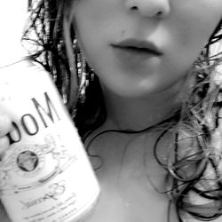 OnlyFans Model in Her Bathing Suit, Bottle of Beer and Can of Dom