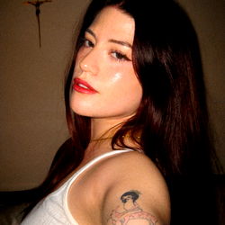 Intimate Photo of OnlyFans Model Angel, Tattoo and Genuine Smile