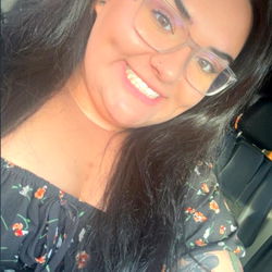 Smiling Nikki in Her Vehicle