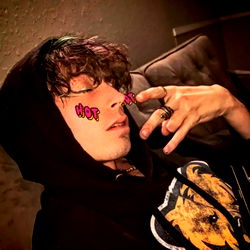 Rising Denver-based musician making waves on social media with catchy beats and a unique style.