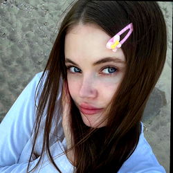 Young Female with Long Hair and Pink Accessory