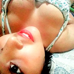 Beautiful Woman Smiling on Bed