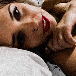 Intimate Moment of a Woman in Her Bedroom