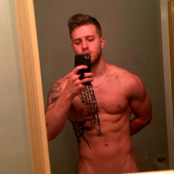 Longboat Viking: Chiseled Fitness Model in Gym Mirror