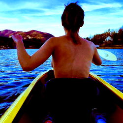 Nude Kayaker on River