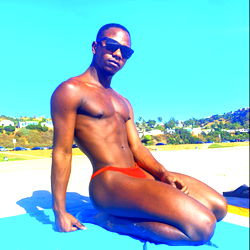 Fit Model Aidan Eden in Stylish Swimwear, Beachside