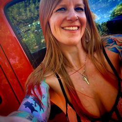 A Woman in a Tattooed Dress on OnlyFans