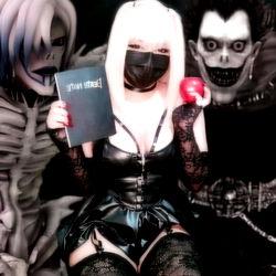 OnlyFans Model in Gothic Fashion with Book and Apple
