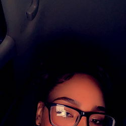 A Woman in a Car, Taking a Selfie