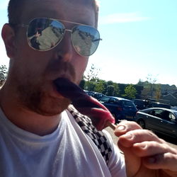 A man with ADHD enjoying a popsicle on a sunny day