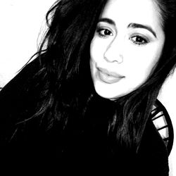 Beautiful Woman in a Sweater with Long Hair and Locks