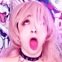 Exuberant Femboy Model in Cosplay with Tongue Out