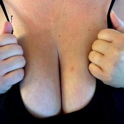 Busty Bombshell: A Glimpse into Her World