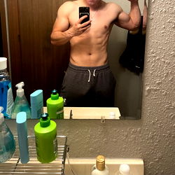 Fitness Model Ben Showcasing His Abs