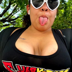 A lively image of Nasttie Nattie, a social media model, with vibrant colors and an energetic pose