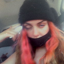 Livi, an OnlyFans Model in a Black Beanie and Sunglasses