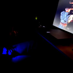 A Person Watching a Video on a Computer Monitor