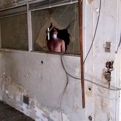 Model's Photo of Abandoned Room with Surreal Element