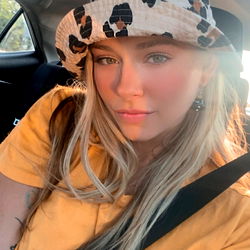 OnlyFans Model Audrey Oakley Posing in a Car