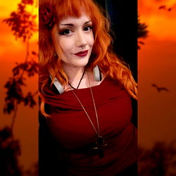 Model with Red Hair and Tattoo in Erotic Photoshoot