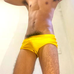 Pentelhudogozador, OnlyFans Model, Flexing in Yellow Swim Trunks