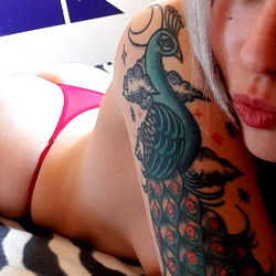 Intimate and Tattooed OnlyFans Model