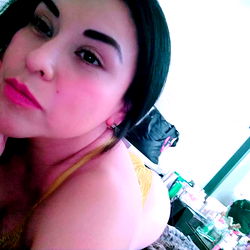 Afrodita Venus De Milo, a sultry model posing for the camera