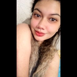 Ashley Vacs, a content creator with a bright smile