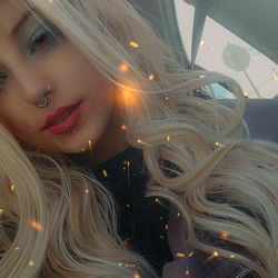 Blonde Model with Cat Filter and Spooky Background