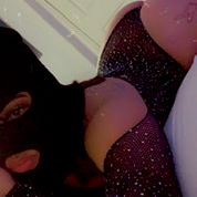 Seductive OnlyFans Model in a Lingerie-like Outfit, Taking a Mirror Selfie