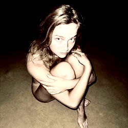 Wenus S, a young woman in an intimate pose