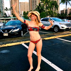 Gabi Arnold, a model in a bikini on the beach