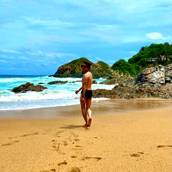 Stylish model Andrew1111 on a beach
