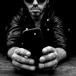 A Model in a Unique Pose with Phone