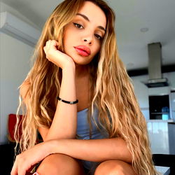 Nicole Bambi, a Model Posing with Restful Expression