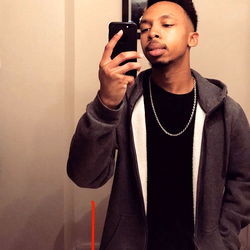 Man in Hoodie Taking Selfie