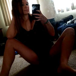 Teanna, a tantalizing OnlyFans model, strikes a seductive pose for her fans