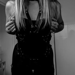 OnlyFans Model Findom Nomad Baby Showcasing BDSM Fetishwear and Leather Bodysuit