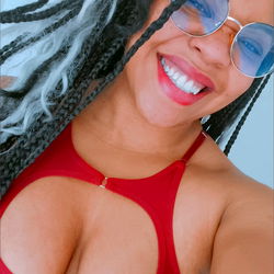 Cheerful OnlyFans Model in Red Swimwear