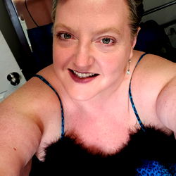 SandiSinz in Playful Pose