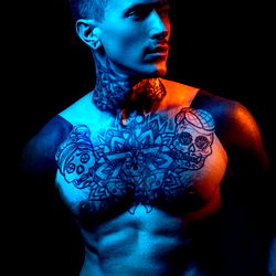 Arthur Inkxx: Tattooed Model in Blue Lighting
