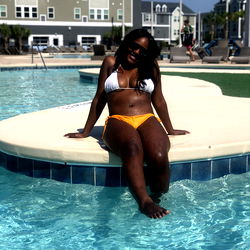 Aree Elle relaxing by the pool