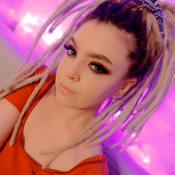 OnlyFans Model 'AnnyStark' in Colorful Wig and Red Shirt