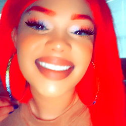 Redruby13, a vibrant OnlyFans model from South Carolina