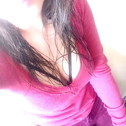 Fashionable Model Andariel in Stylish Red Sweater and Jeans