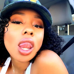 Najee Chanel: A Model Posing for an OnlyFans-style Photo