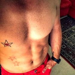 Antidiesel in London, Fitness Model in Red Shirt and Tattoo